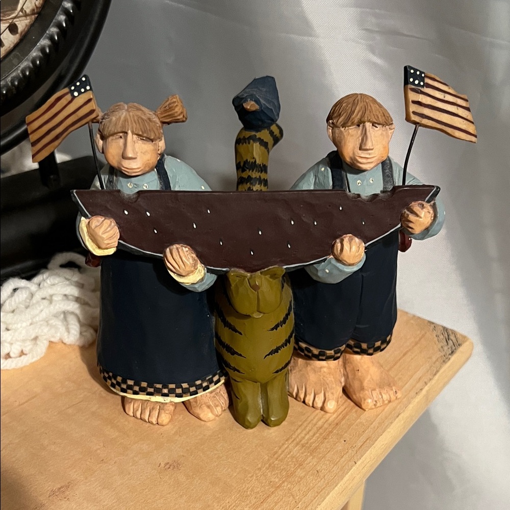 Charming Figurine with Flag and Stripes